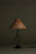 Alaric Rattan Shade Table Lamp styled in a room