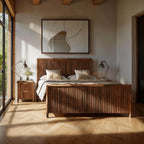 Modern bedroom with wooden bed and abstract art on the wall