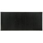 Black rectangular mat with a textured surface on a white background