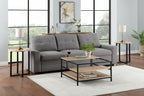 Gray sectional sofa in a living room with a coffee table and decor items.