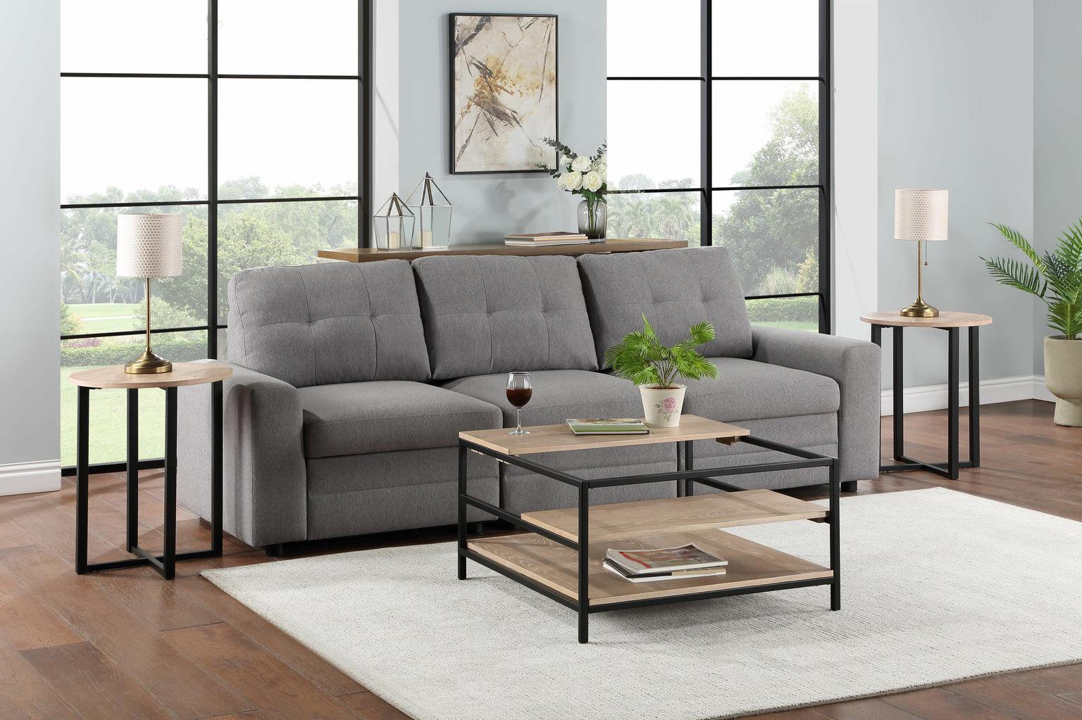 Gray sectional sofa in a living room with a coffee table and decor items.