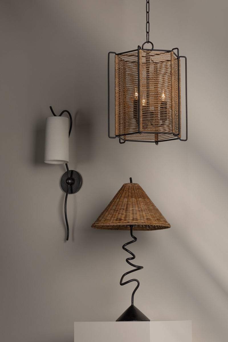 Alaric Rattan Shade Table Lamp styled in a room 2