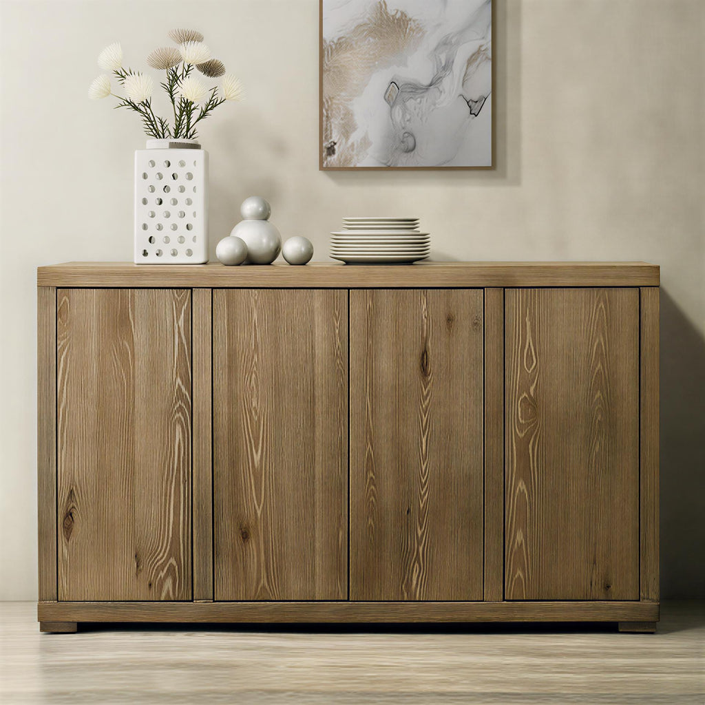 Wooden sideboard with decorative items on a neutral wall background
