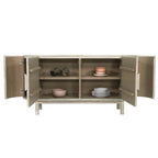 Wooden sideboard with open doors displaying various ceramic items on a white background