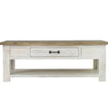 Wooden coffee table with a white washed base and wooden top on a white background