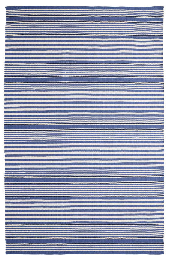 A striped indoor/outdoor handwoven rug with blue and white colors