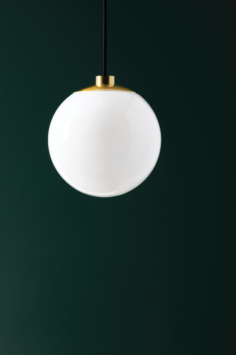 Stella globe pendant lights styled in a room