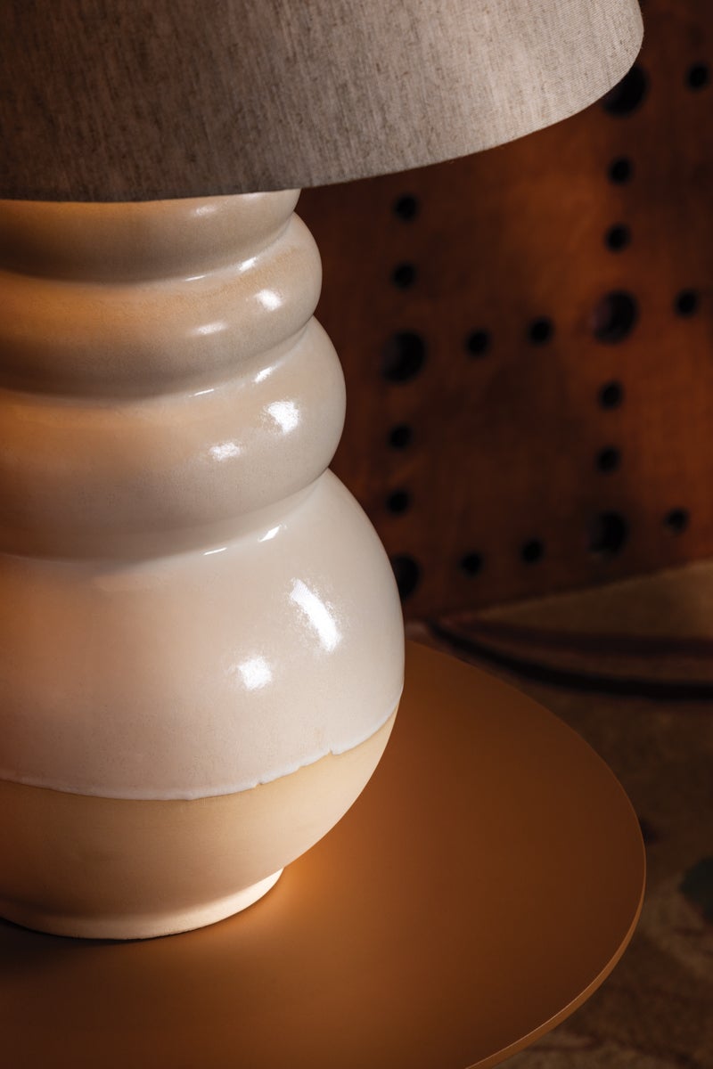 Tybee Ceramic Table Lamp by Celerie Kemble styled in a room