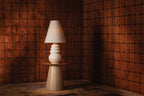 Tybee Ceramic Table Lamp by Celerie Kemble styled in a room 2
