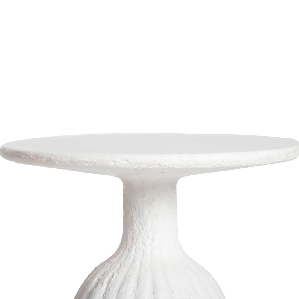 White marble side table on a white background