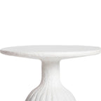 White marble side table on a white background