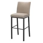Bar stool with beige cushioned seat and black metal legs on a white background