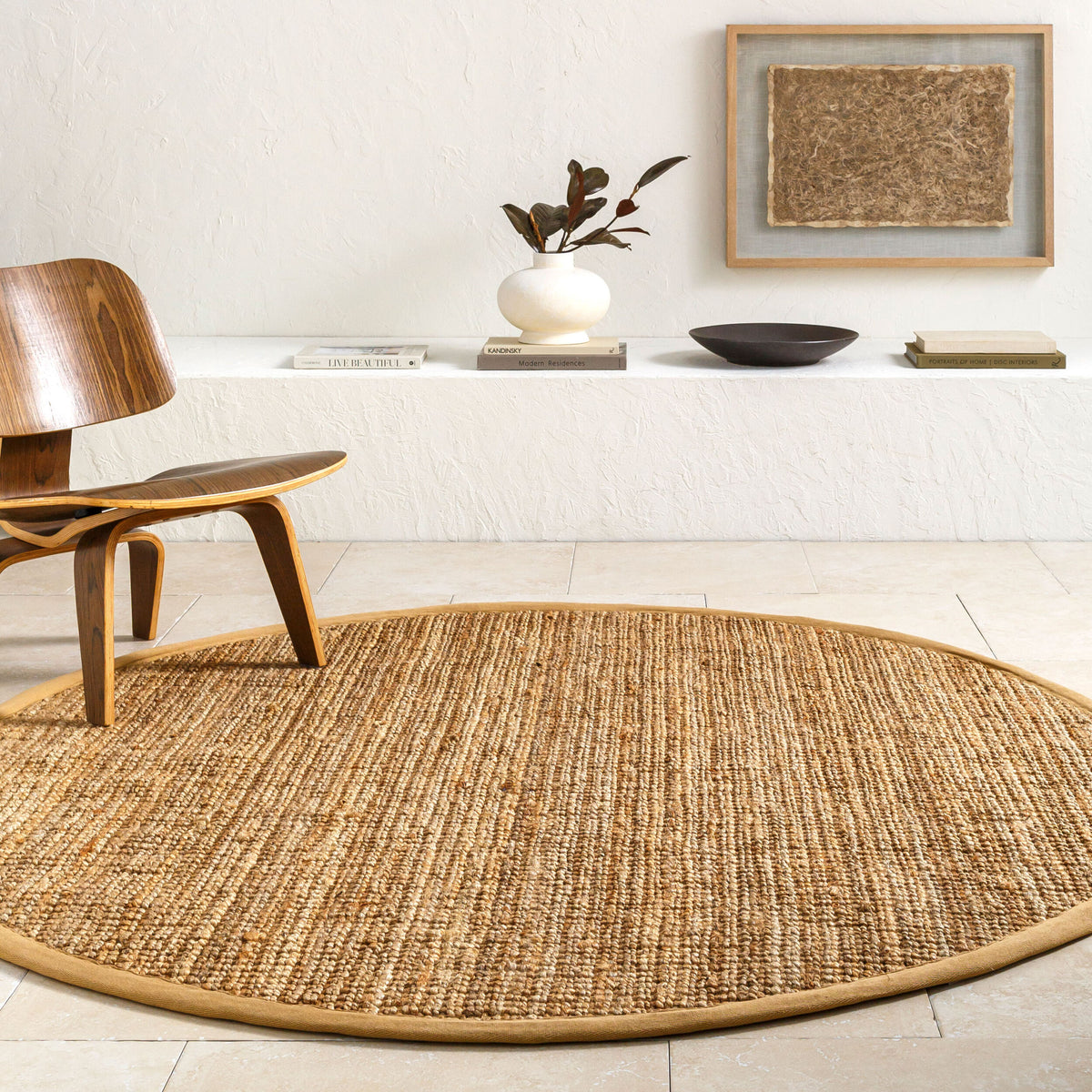 Calla Hand-Woven Jute Rug styled in a room