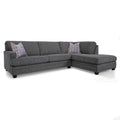 Gray sectional sofa with patterned cushions on a white background