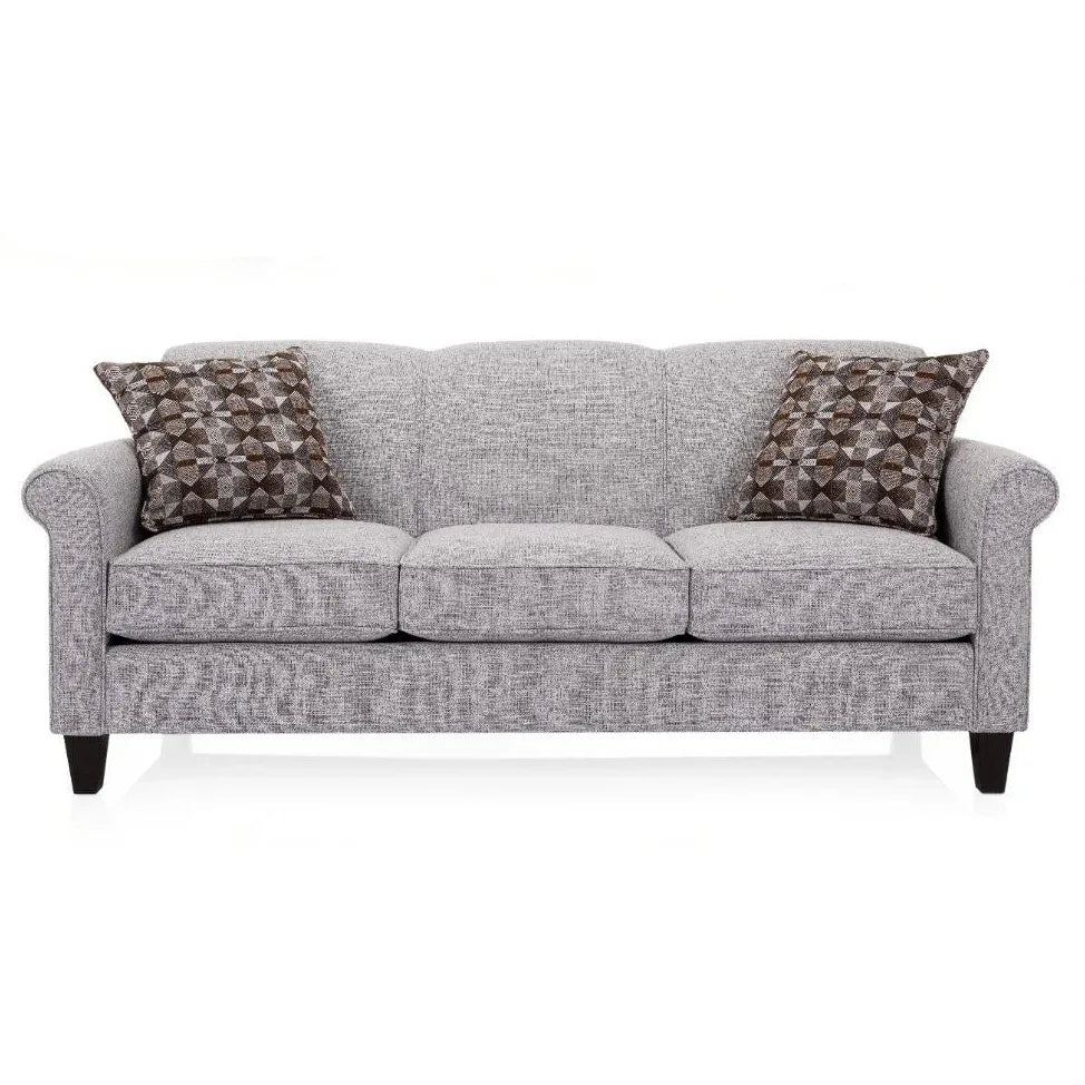 Gray sofa with patterned cushions on a white background