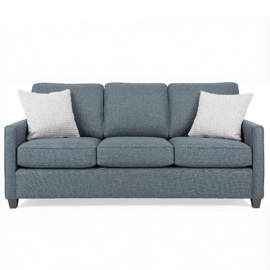 Blue queen sofa sleeper with two pillows on a white background