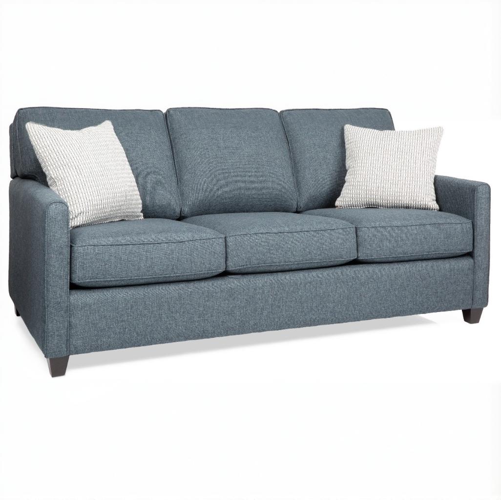 Blue queen sofa sleeper with white pillows on a white background