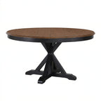 Round wooden table with black base on a white background
