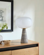 Domara Travertine Table Lamp styled in a room