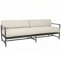 Beige sofa with metal frame on a white background