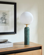 Portava Marble Globe Table Lamp styled in a room