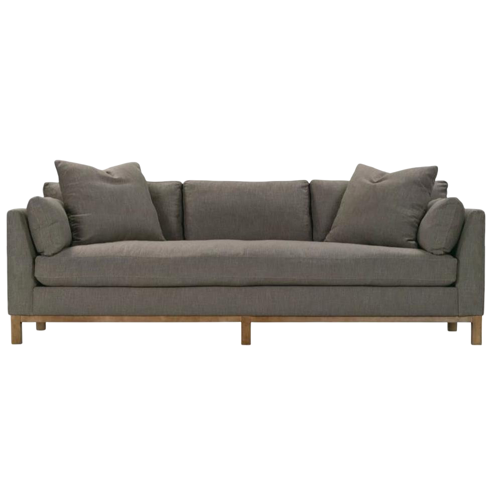 Gray sofa with cushions on a white background