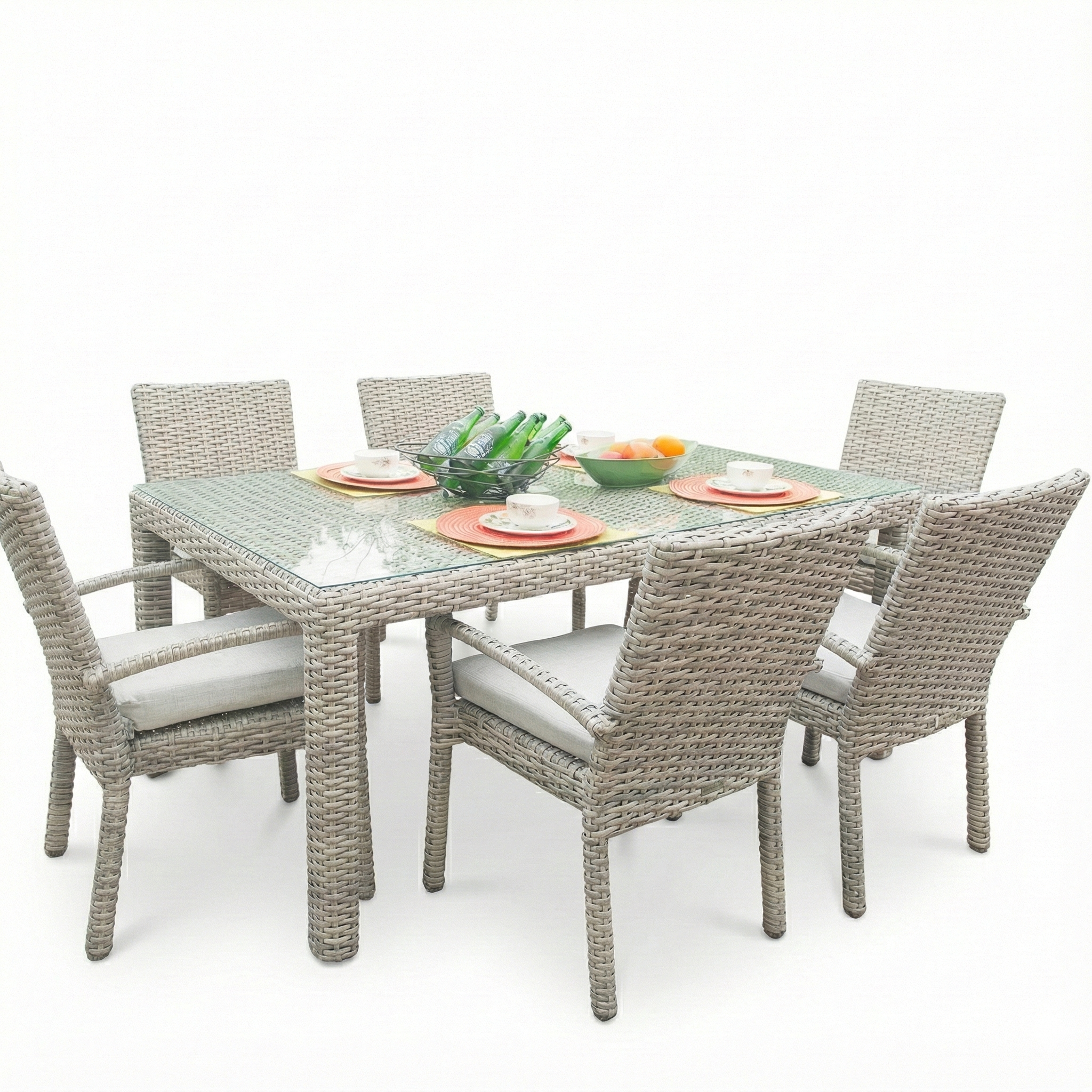 Outdoor dining set with a table and six chairs on a white background