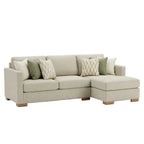 Beige sectional sofa with multiple cushions on a white background